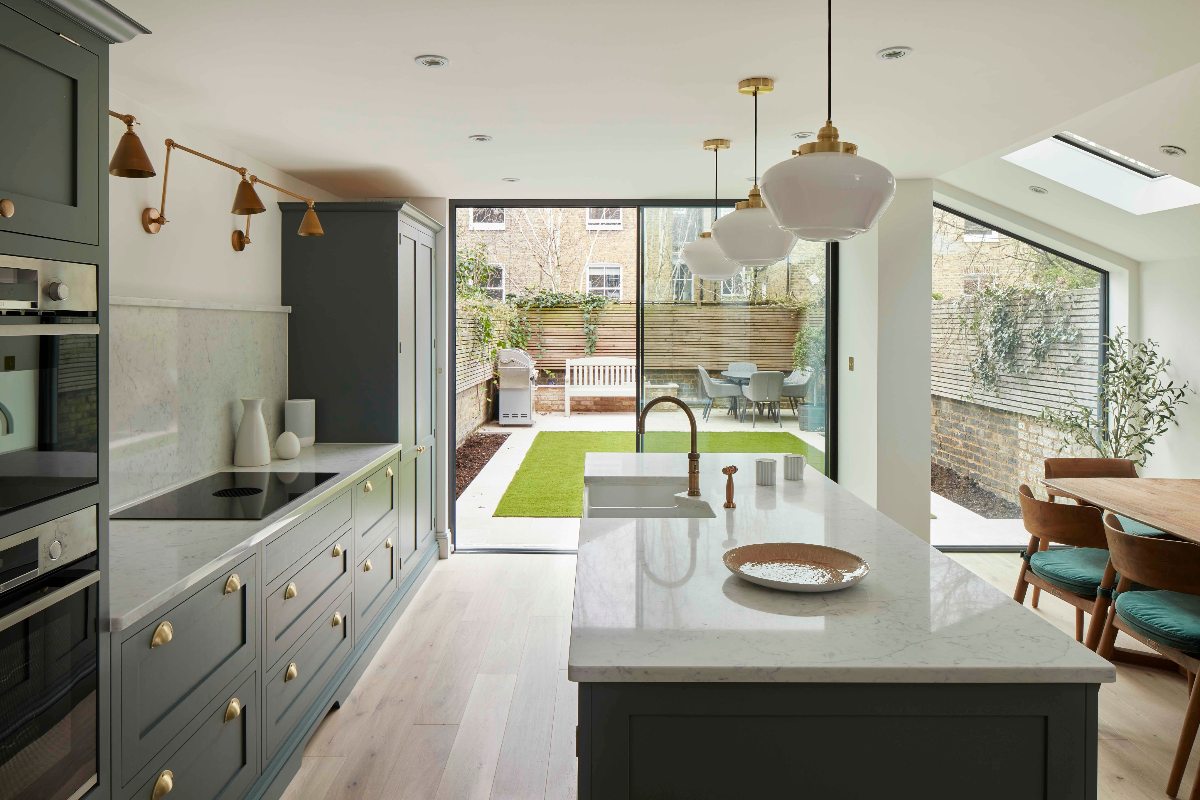 Surrey Hampshire border kitchen extension with green cabinets - Extension designer Winchester Basingstoke